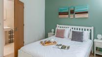 The double bedroom has a comfortable bed and en suite shower.