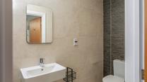 The stylish en suite shower in the double bedroom.