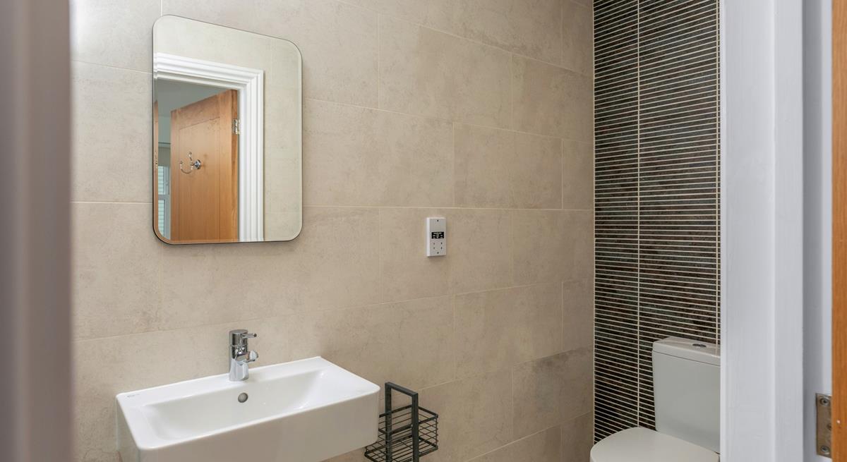 The stylish en suite shower in the double bedroom.