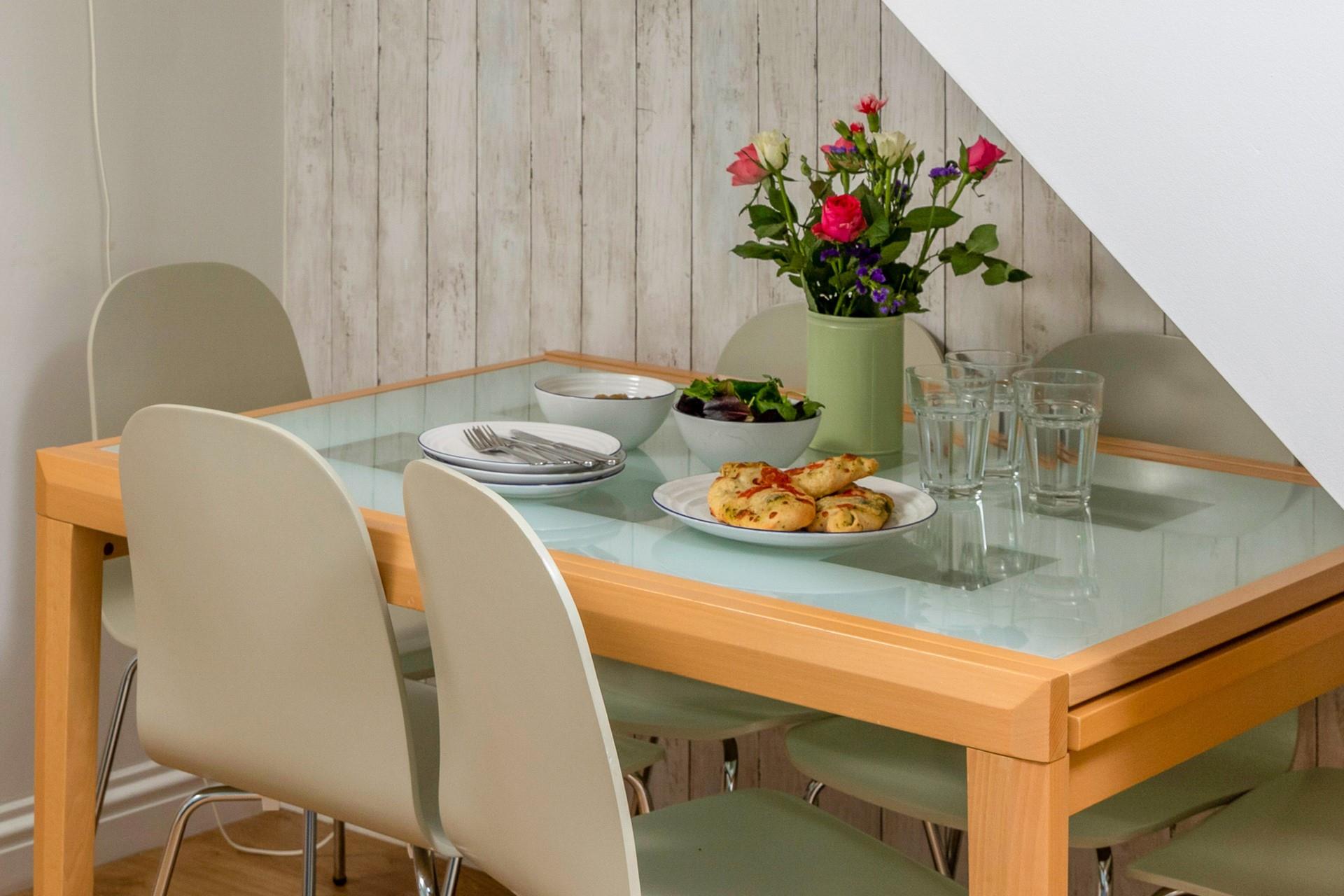 There's seating for six around the dining table.