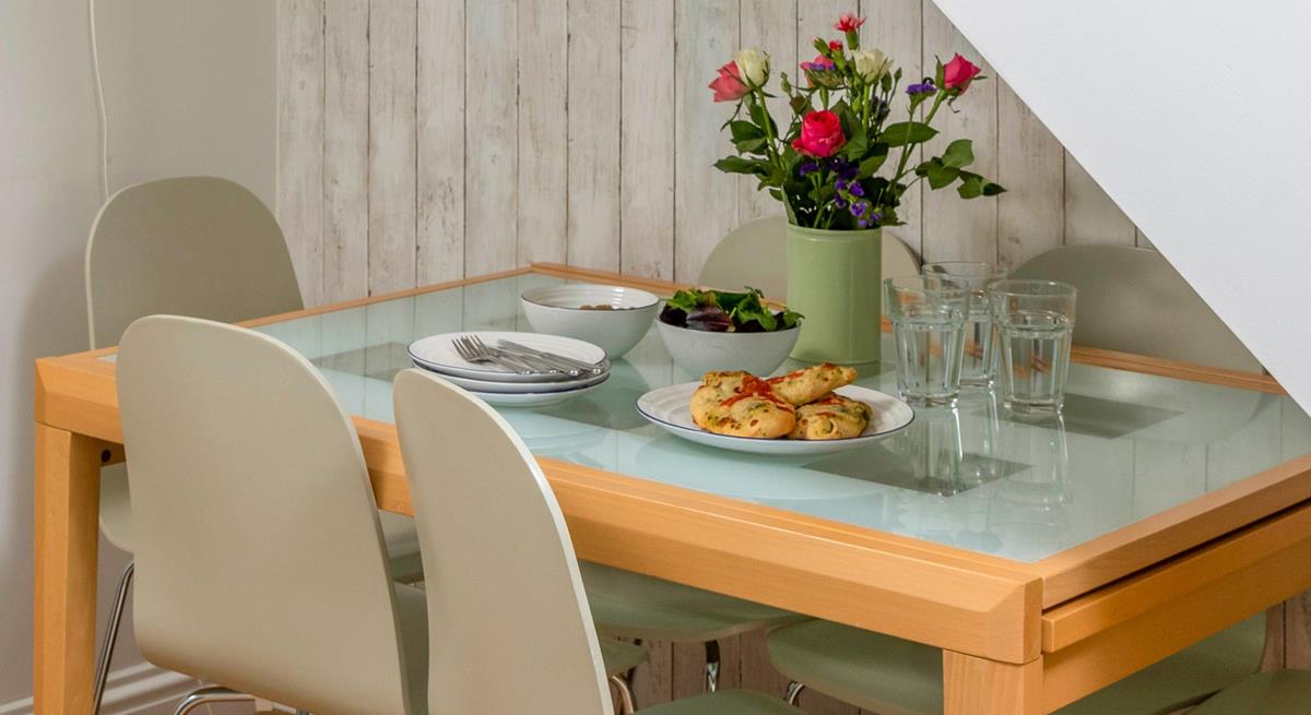 There's seating for six around the dining table.