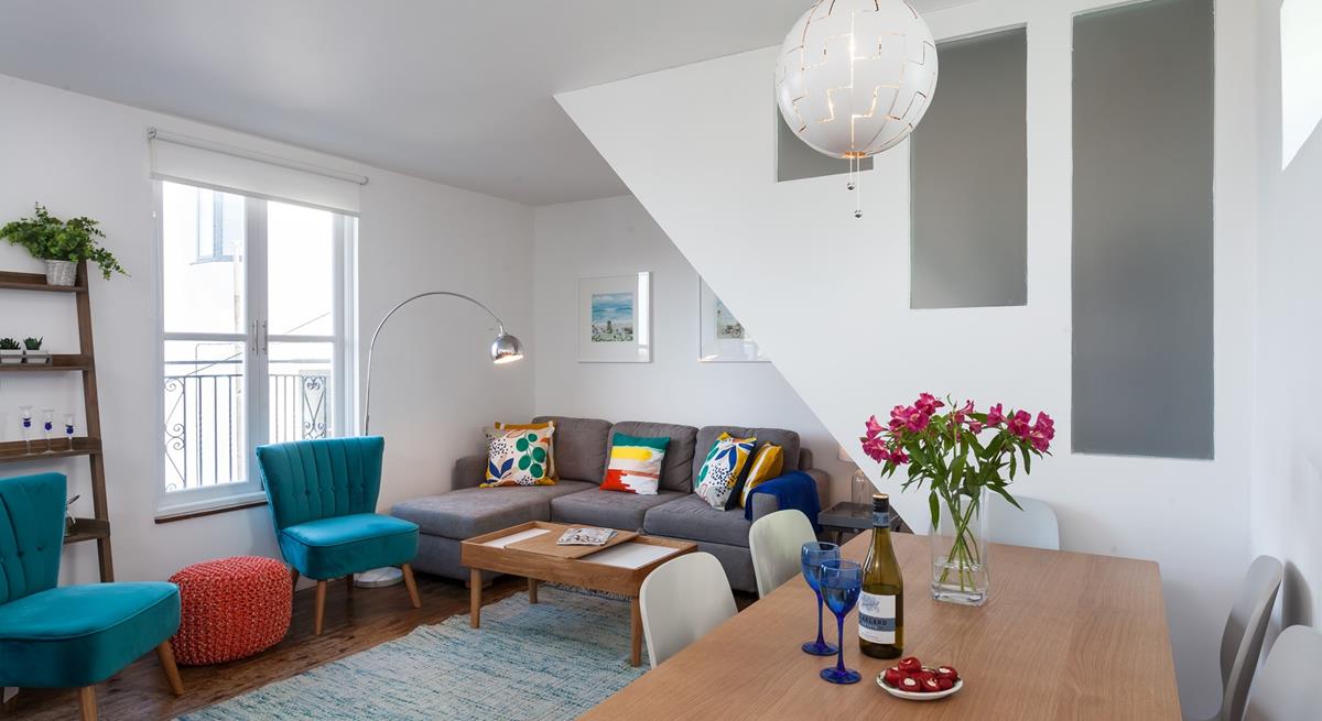 The sitting room is bright and cosy for relaxing evenings.