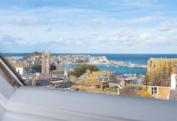 Enjoy views over the rooftops across to the quaint harbour.