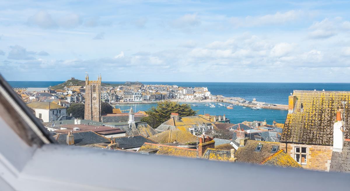 Enjoy views over the rooftops across to the quaint harbour.