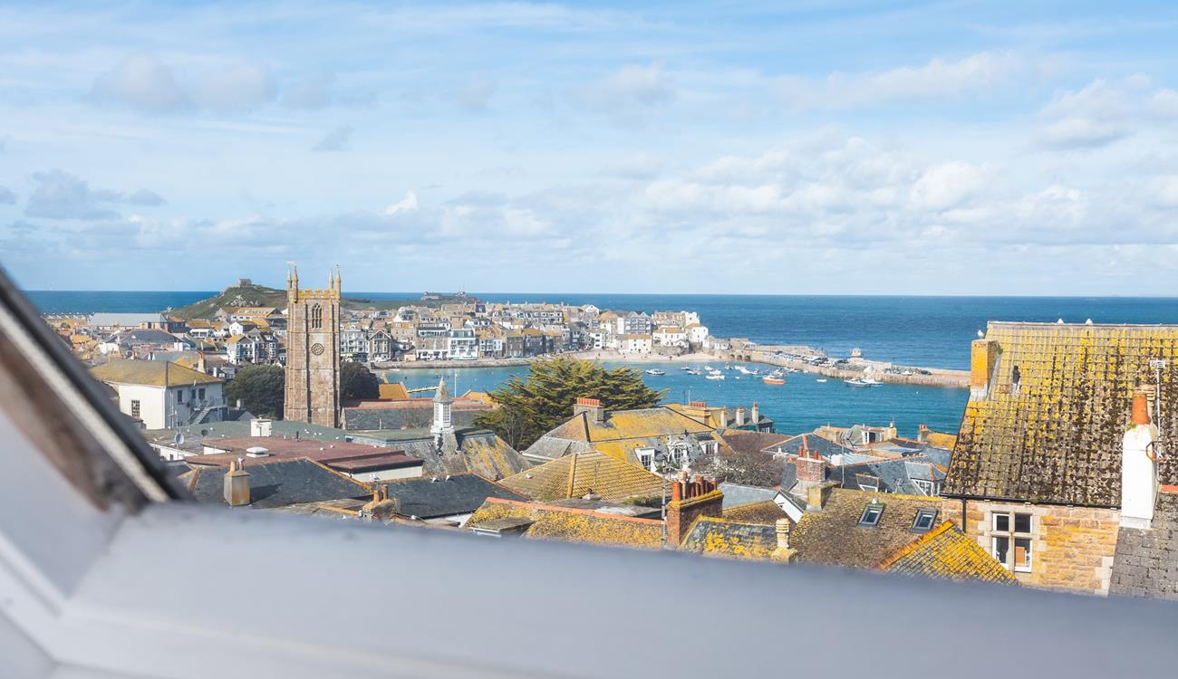 Enjoy views over the rooftops across to the quaint harbour.