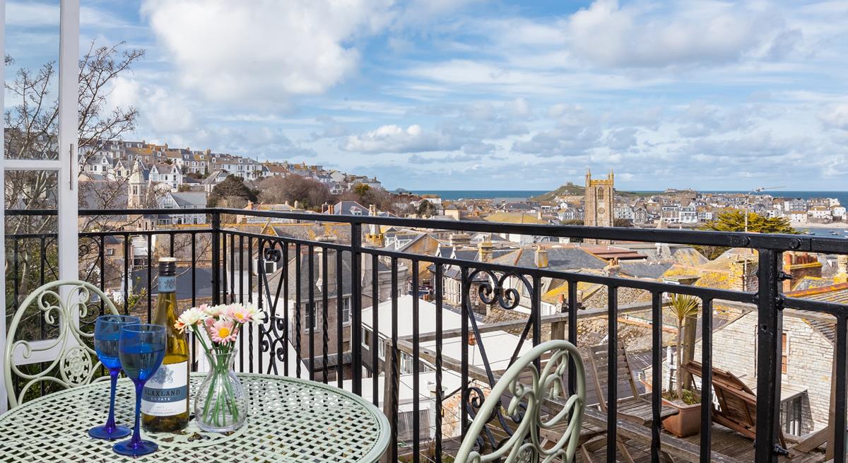 The balcony has views over the rooftops of St Ives stretching as far as the sea.