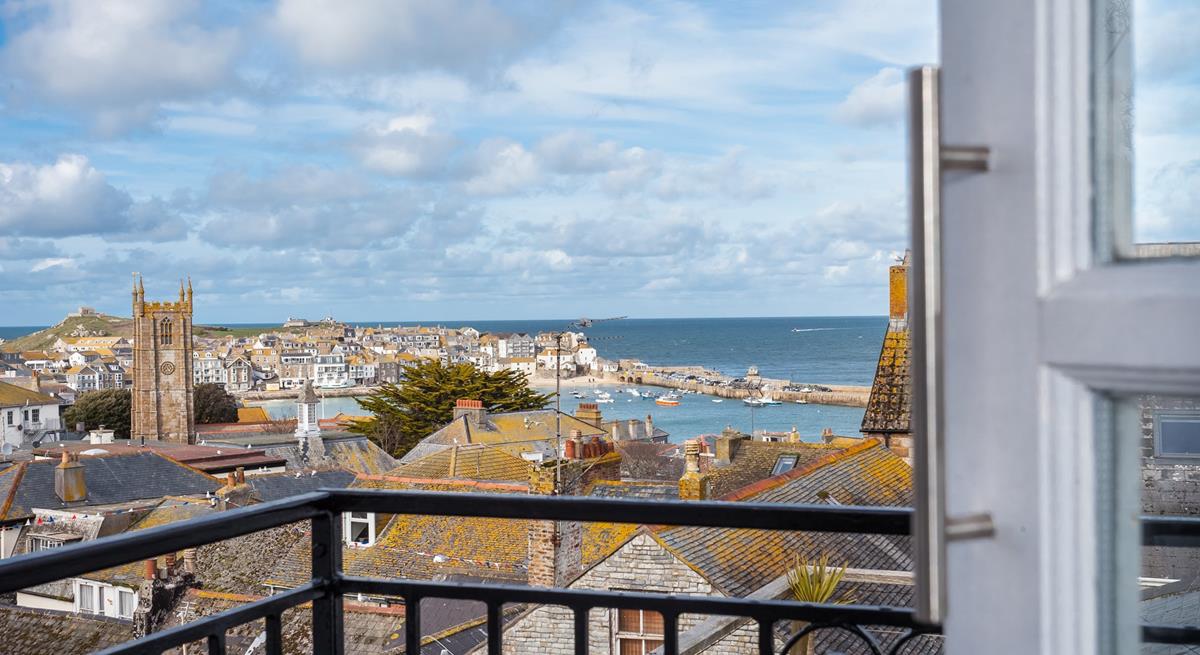 Sit out on the balcony with a glass of wine and watch the sunset over the Island.