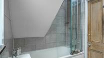 Wash off sandy toes in the shower or run yourself a bath for a long soak.