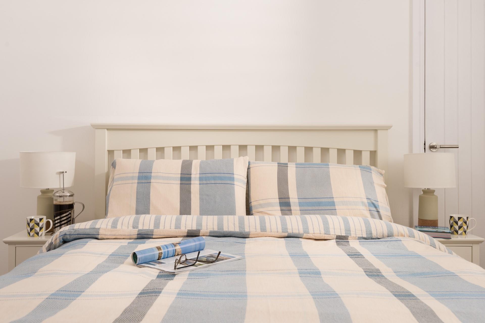 Soft sea-themed tones create a haven for relaxation.