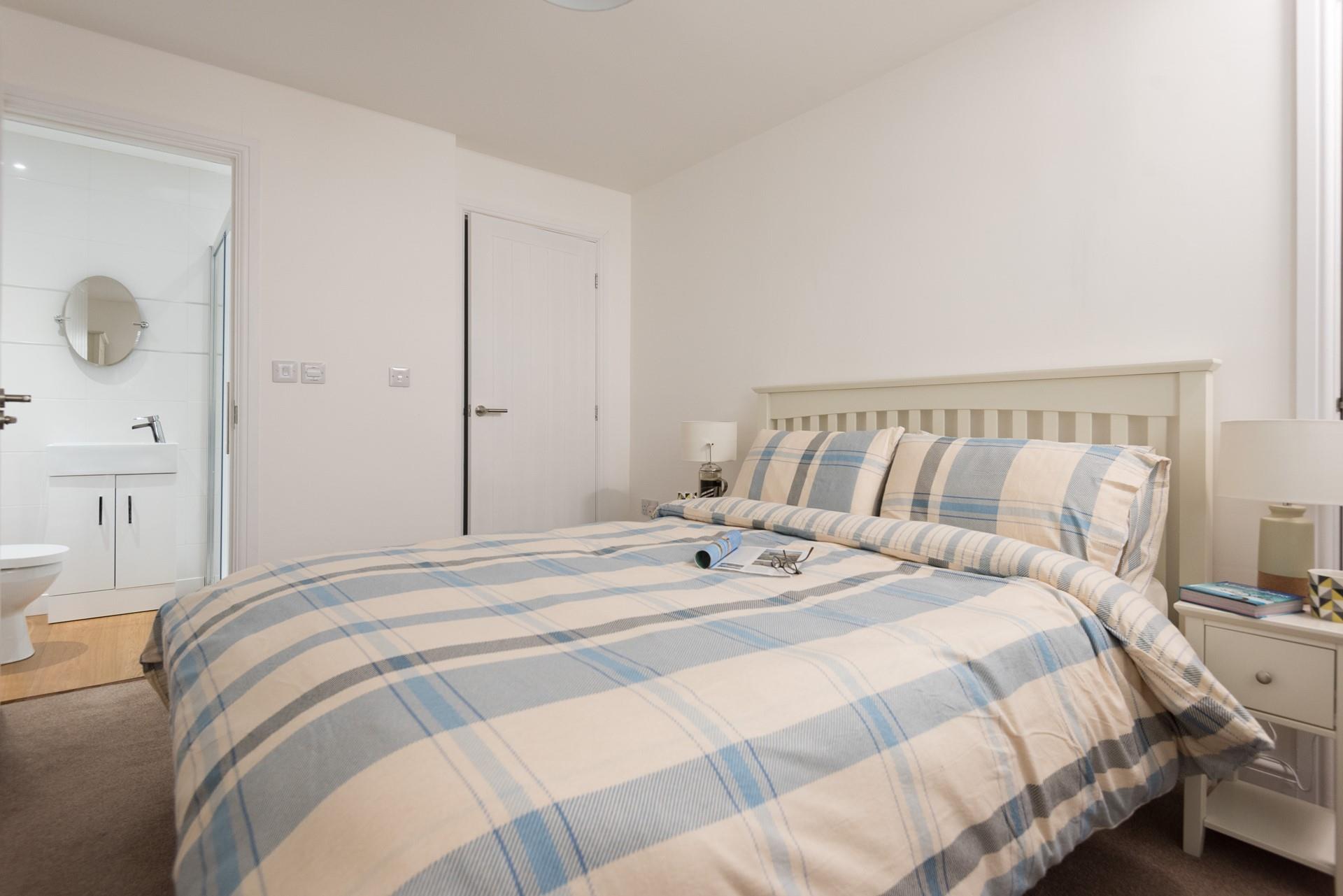 The master bedroom benefits from an en suite, giving everyone extra space and privacy to get ready.