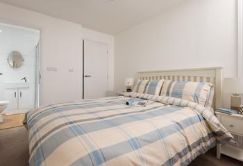 The master bedroom benefits from an en suite, giving everyone extra space and privacy to get ready.