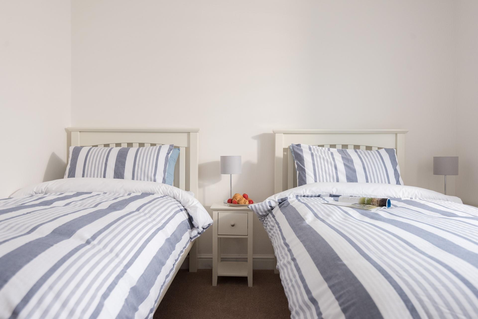 The twin room offers flexible sleeping arrangements, making this perfect for families or friends sharing.