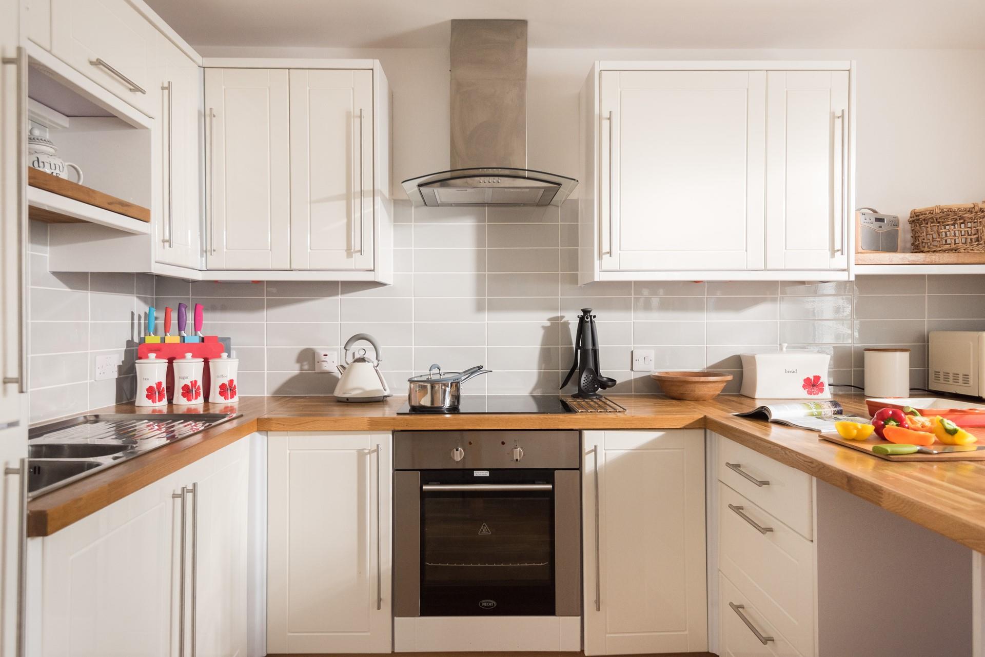 The kitchen has a homely cottage feel making it a delight to cook in.