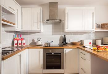 The kitchen has a homely cottage feel making it a delight to cook in.