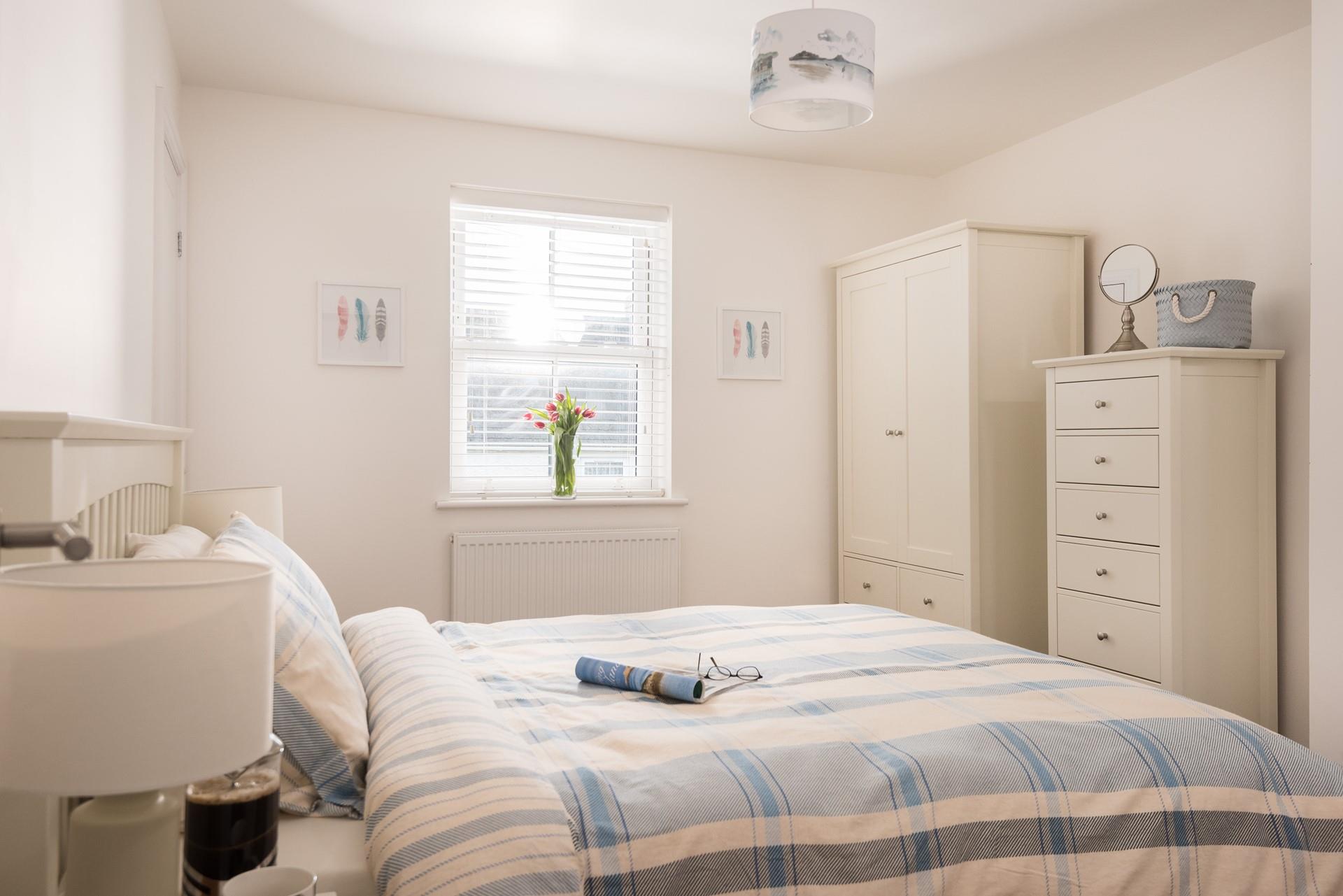 Bedroom 2 has plenty of storage for your holiday best. 