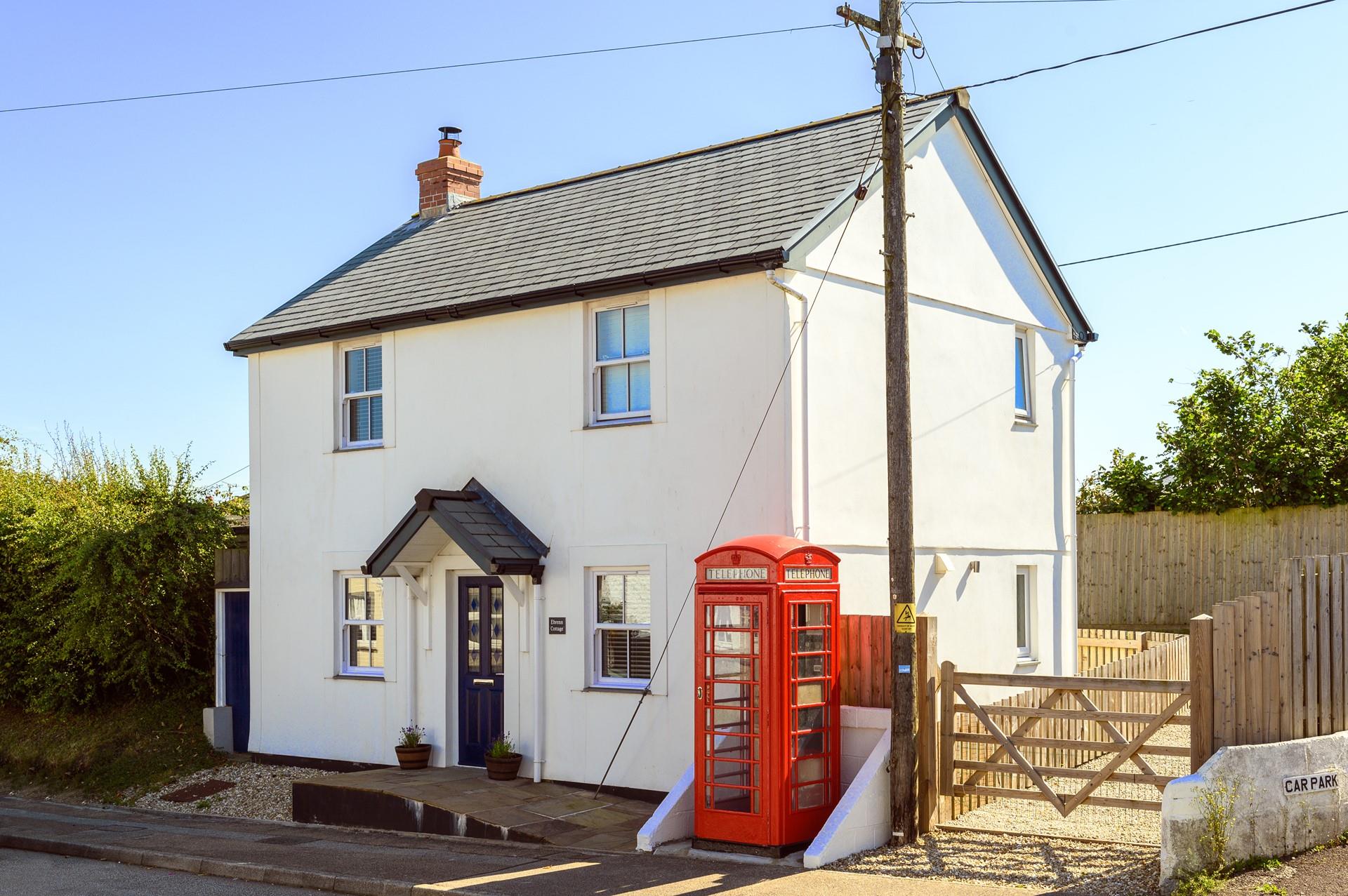 The private driveway is accessed through the five bar wooden gate and has room for two cars.