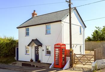 The private driveway is accessed through the five bar wooden gate and has room for two cars.