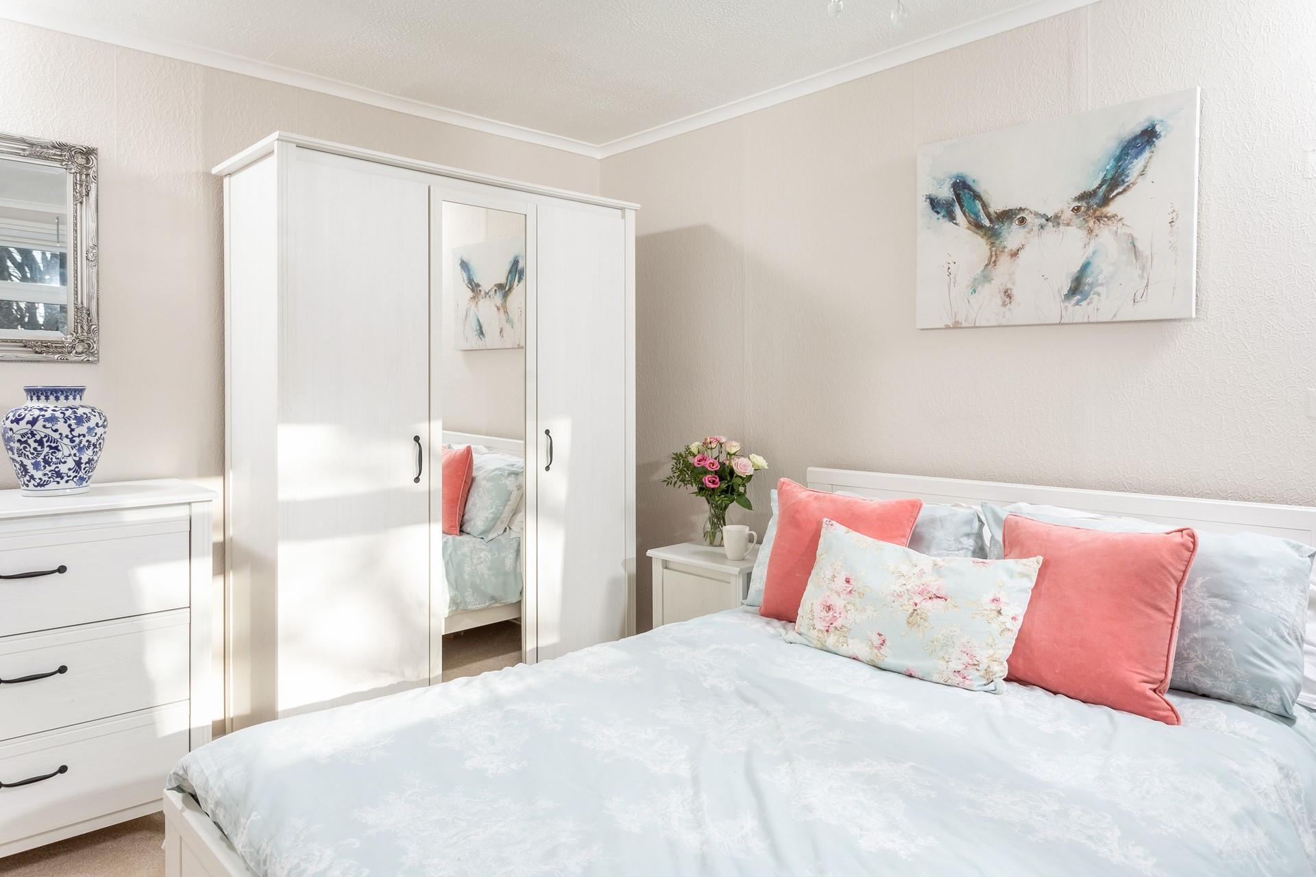 Imagine waking in this beautiful bedroom and opening the curtains to gaze out at gorgeous rural views.