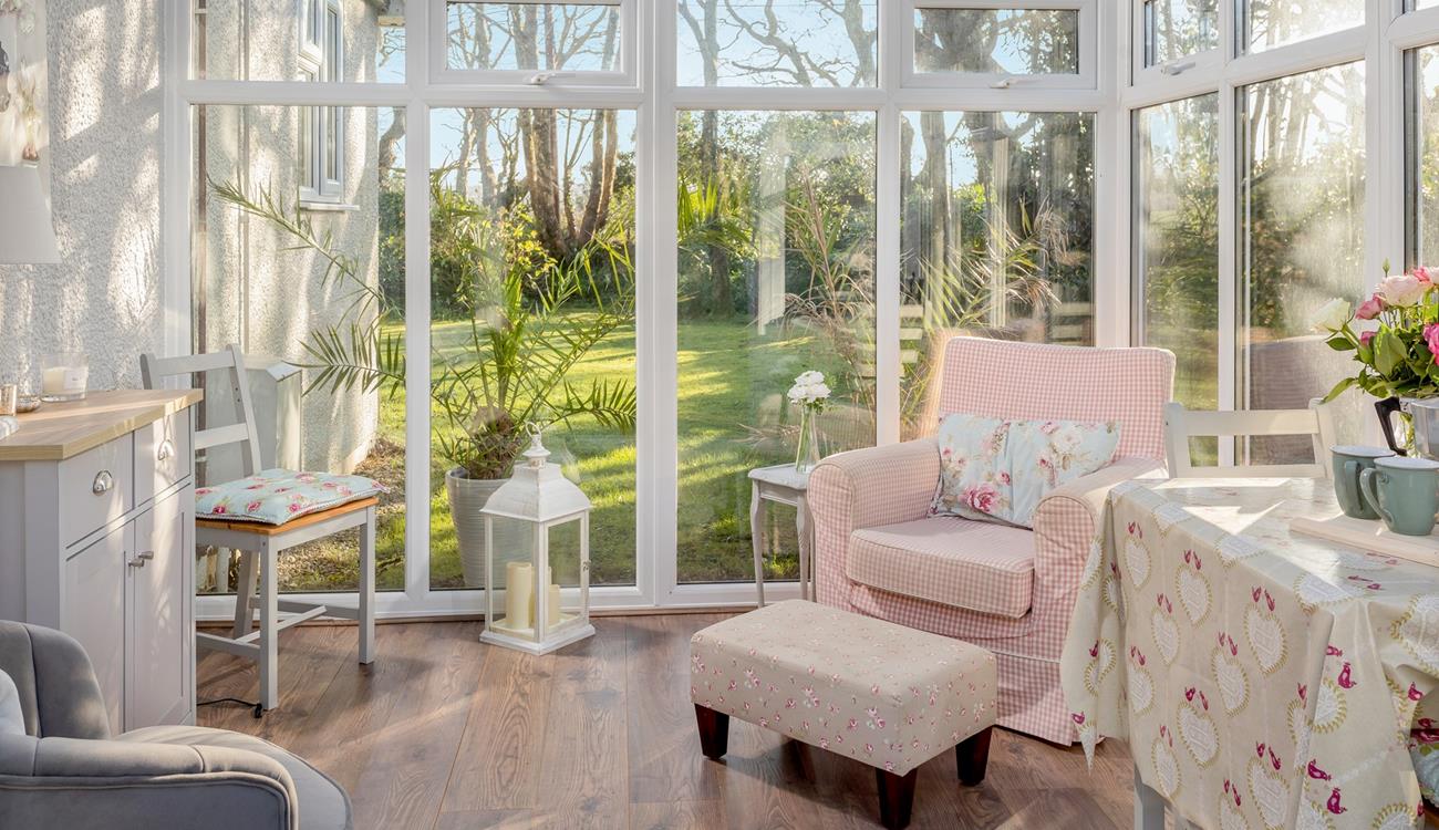 The conservatory dining room is accessed from the garden and is the perfect spot to relax. 