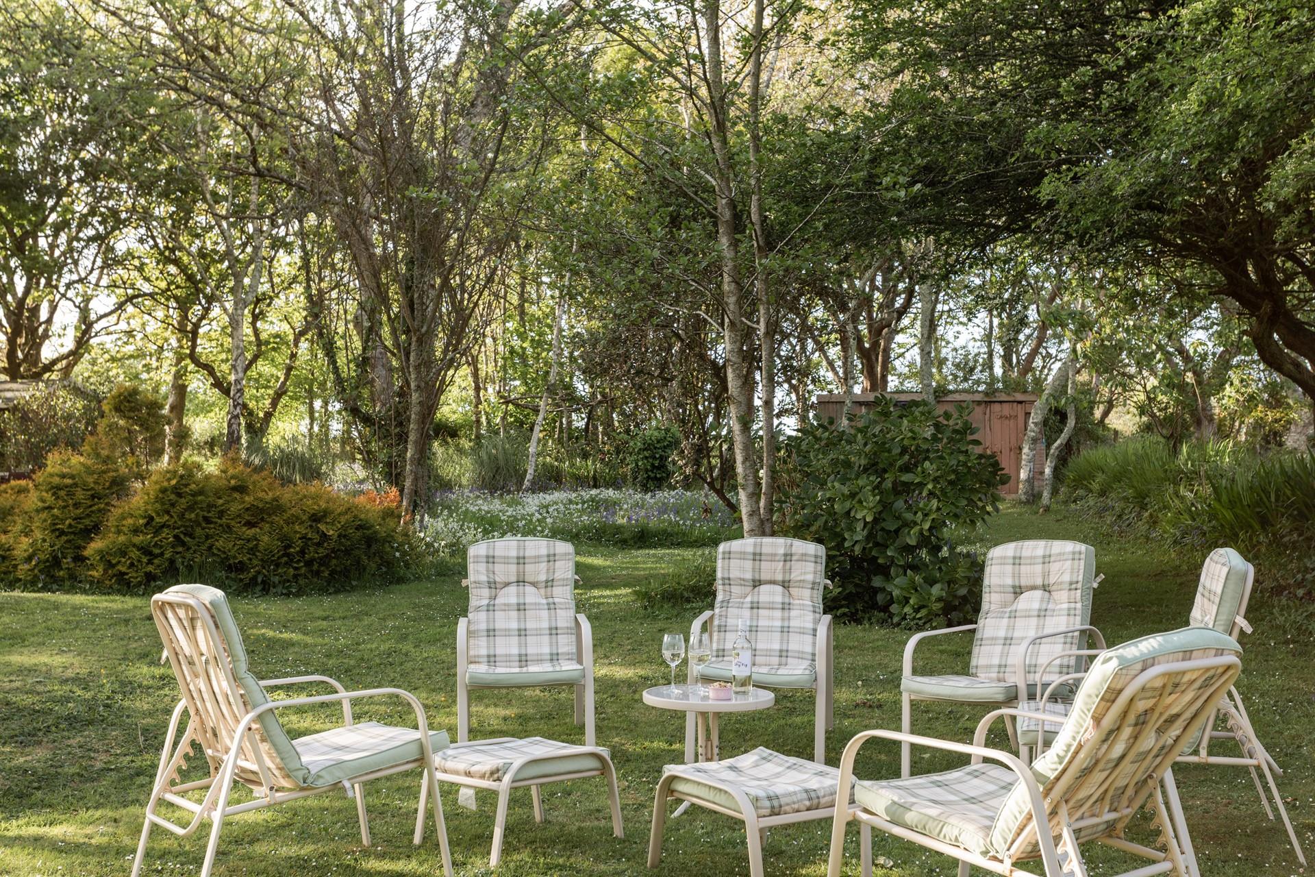 Open a bottle of wine and watch the sun come down between the trees.