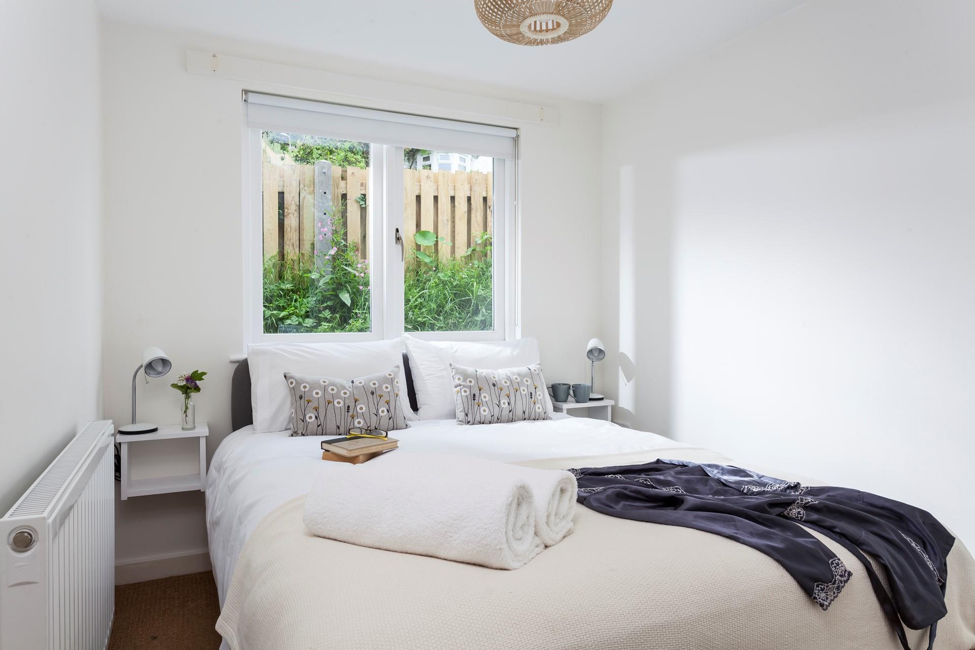 A peaceful night's sleep can be had in the king size bed. 