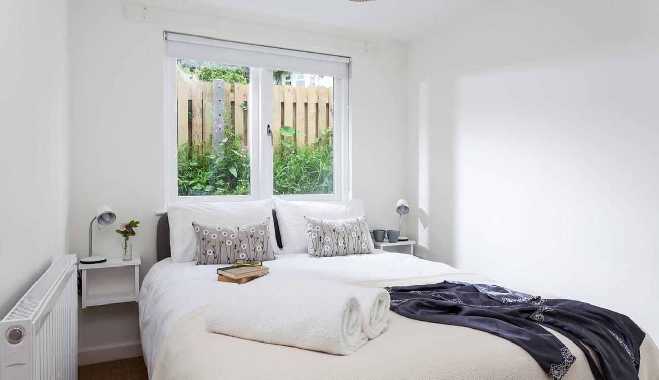 A peaceful night's sleep can be had in the king size bed. 