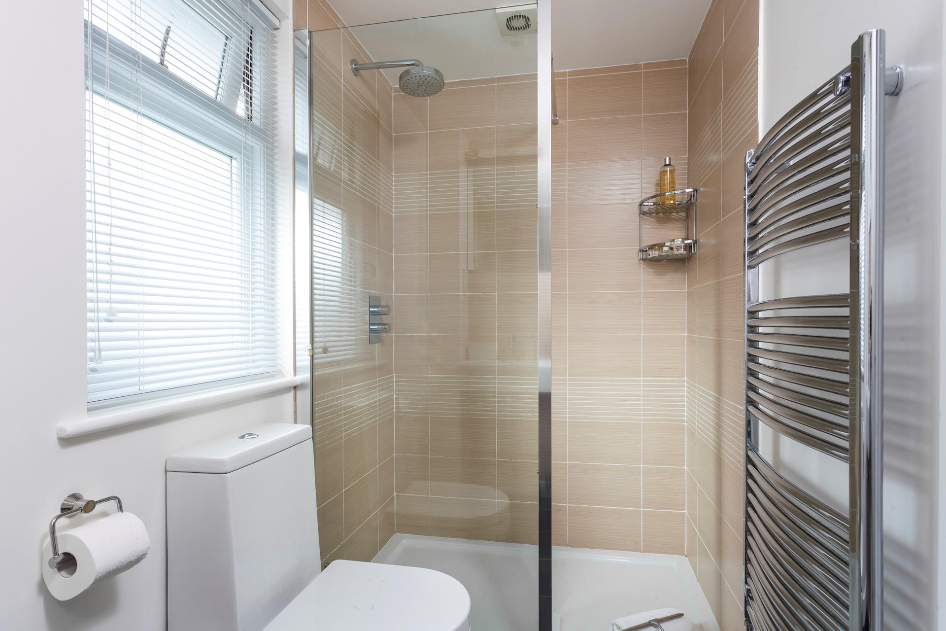 Freshen up for the day ahead in the rainfall shower.