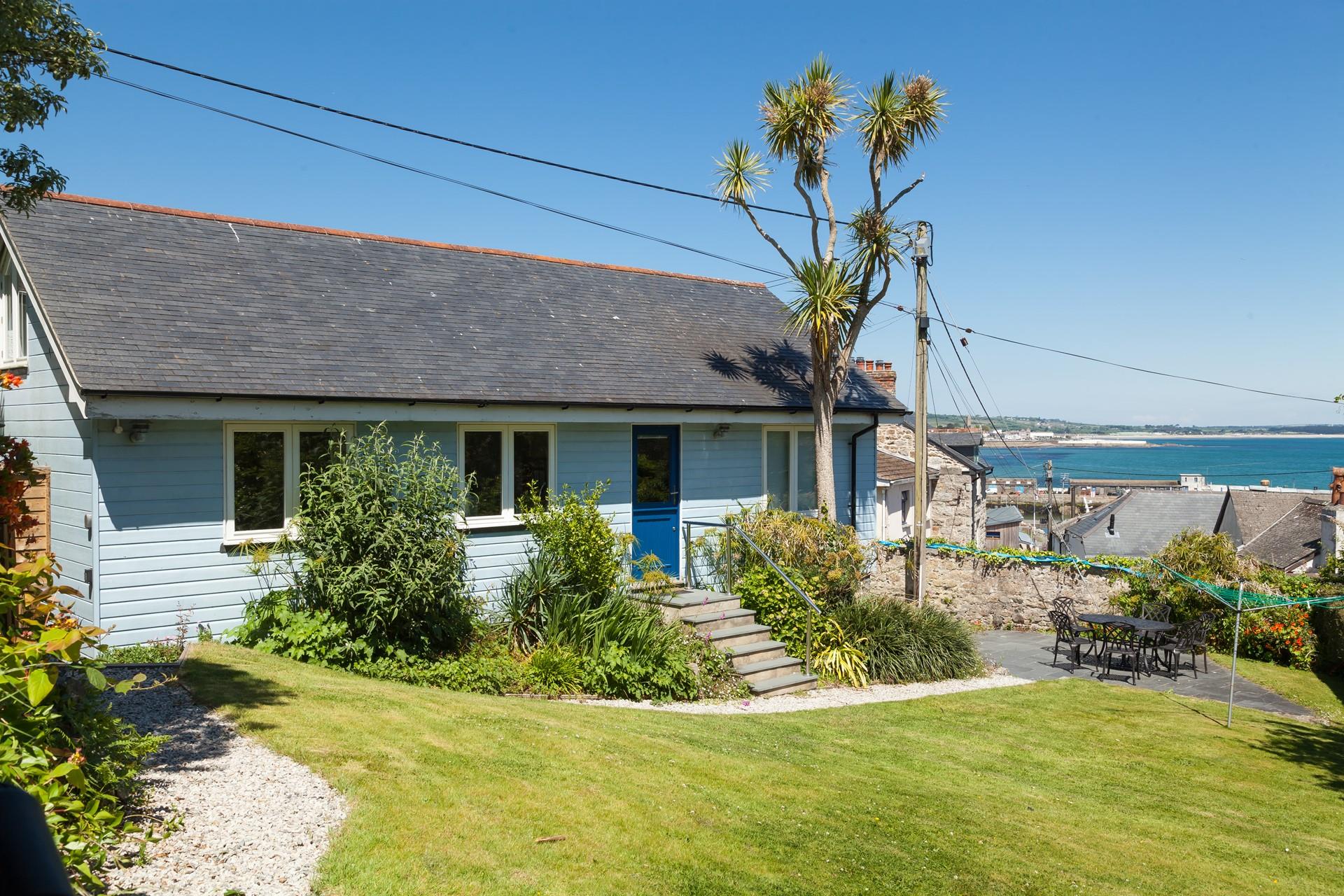This chalet-style home offers sea views across to St Michael's Mount.