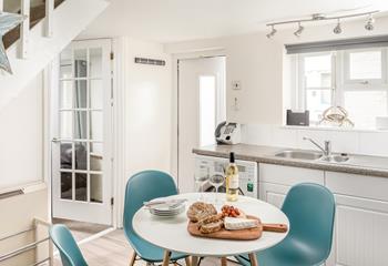 The cosy kitchen with its nautical theme is perfect for enjoying a hearty breakfast before heading off to explore!
