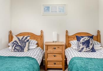 Kids will love the fun nautical-themed bedroom that reminds you just how close to the seaside you are!