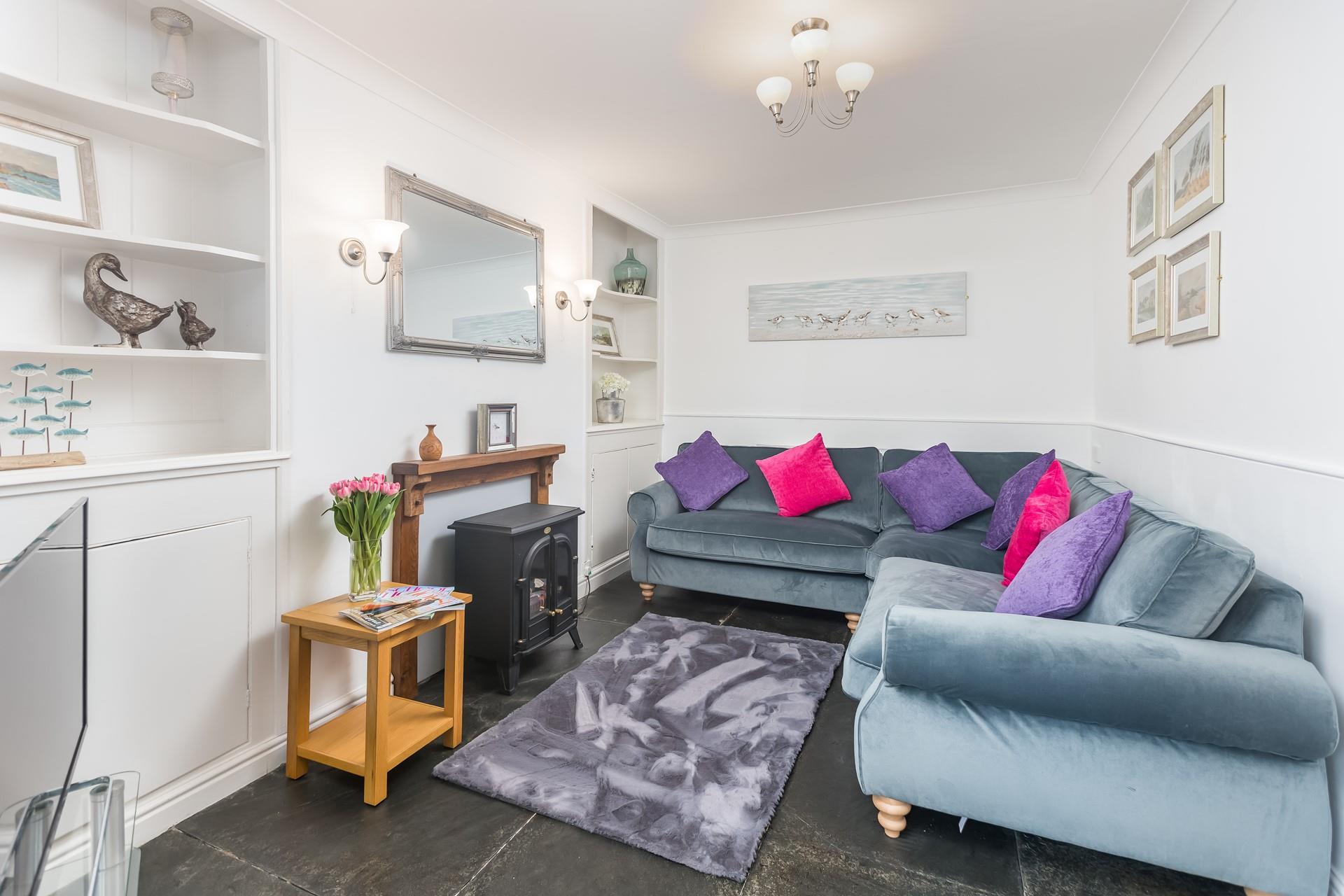 Sink into the plush sofa and enjoy a relaxing night in the sitting room.