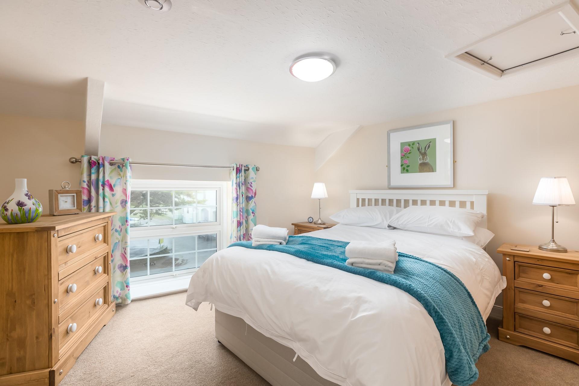 Bedroom 1 has a super comfy double bed for a relaxing night's sleep.