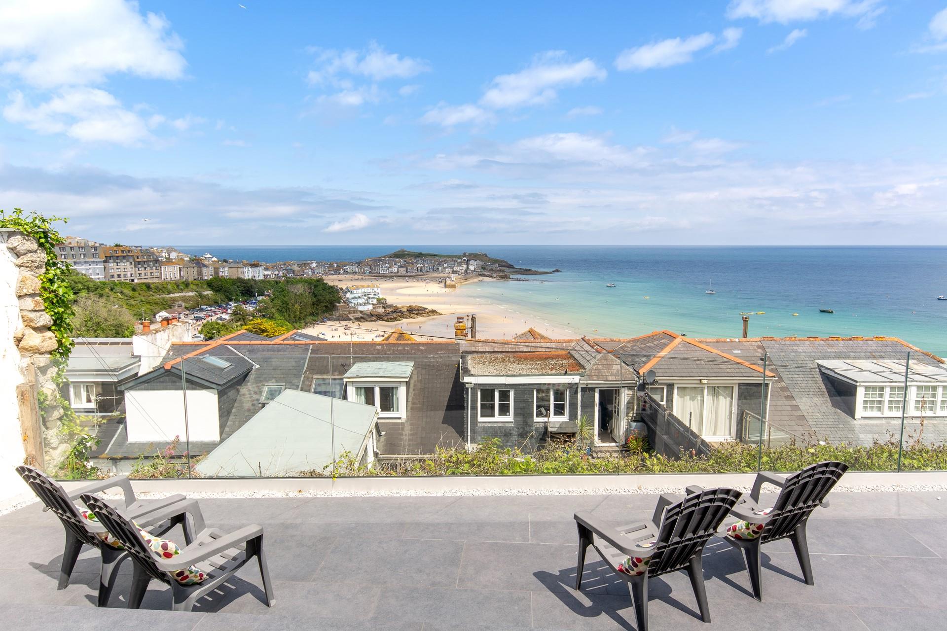 The view across St Ives Bay and Harbour is beautiful and can be enjoyed from the terraced patio area.