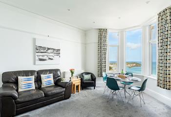 The sitting room area has a full bay window which has a stunning sea view over St Ives.