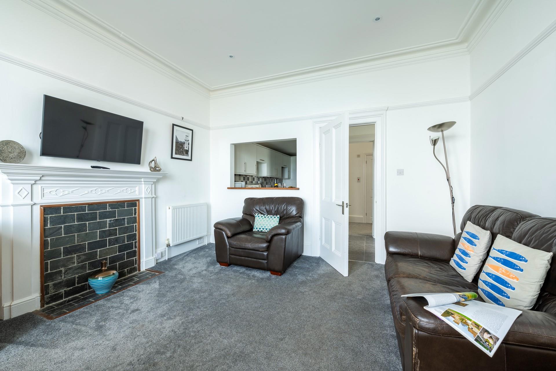 The sitting room provides the ideal base to come back to each day.