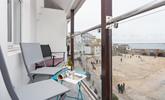 Watch the comings and goings of the harbour from the balcony. - Thumbnail Image