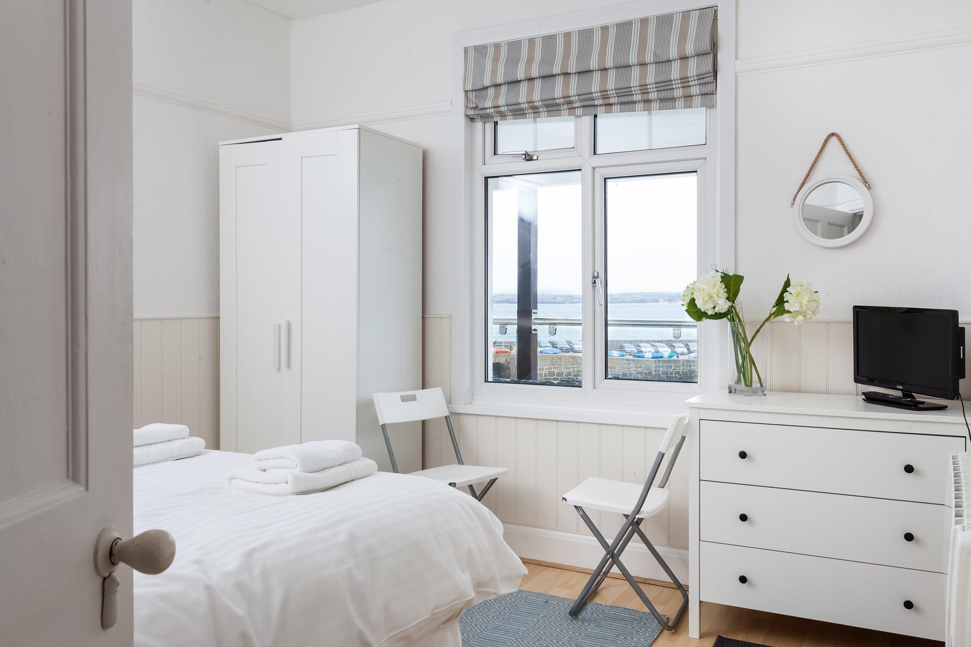 Watch the sun go down outside your window in the comfort of your bed.