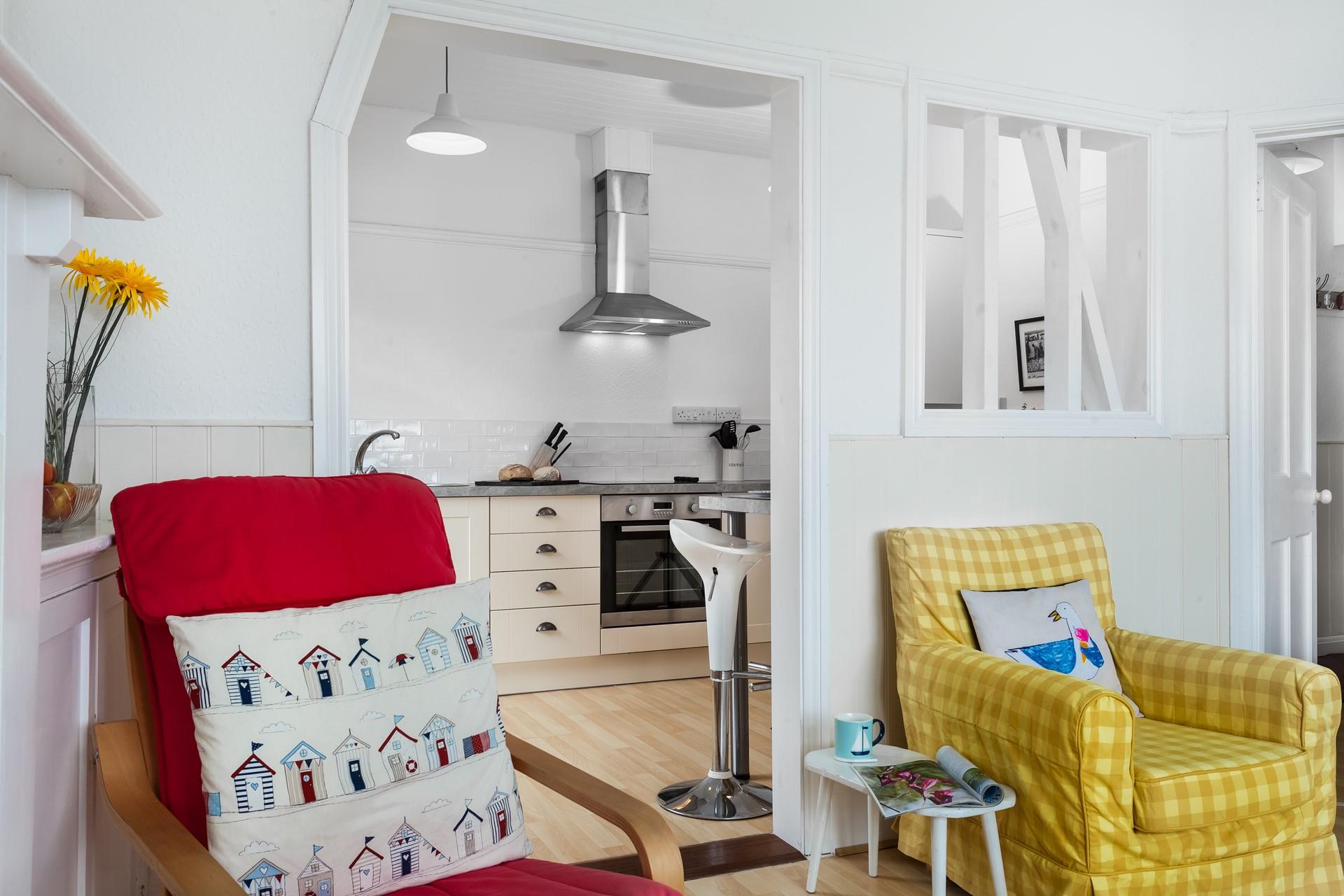 Spend a relaxing evening in the sitting room sipping your favourite drink.