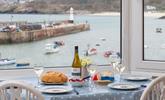 Enjoy dinner with one of the best views in town, all from the comfort of the sitting room. - Thumbnail Image