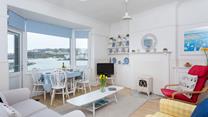 Enjoy breakfast with a view staring out at the boats bobbing in the harbour.