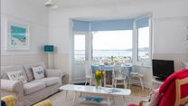 Relax on your sofa with a hot cup of tea after a day spent on the beach.