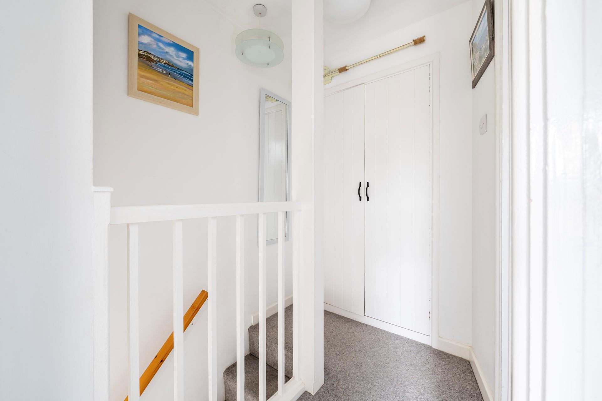 Climb the stairs to retire to one of the cosy bedrooms.