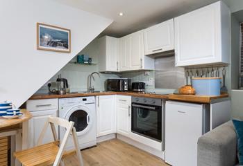 Beautifully designed, the kitchen brings the magic and beauty of the seaside indoors.