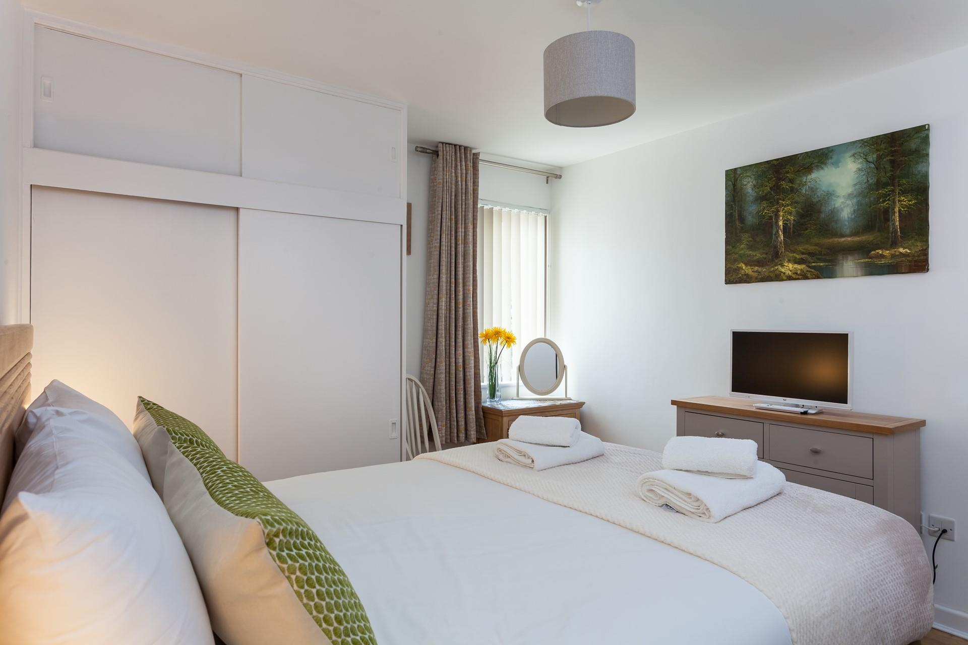 A TV allows you to catch up on your favourite shows before bed!