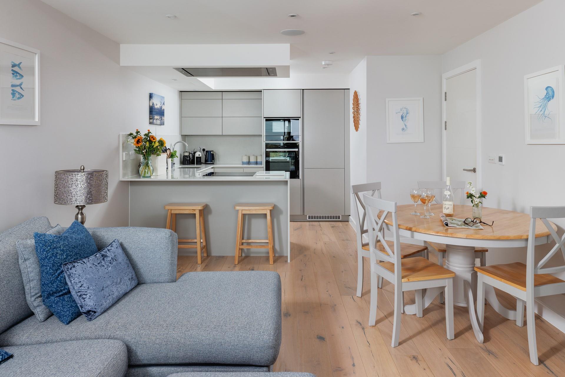 The open-plan living space is modern and stylish.