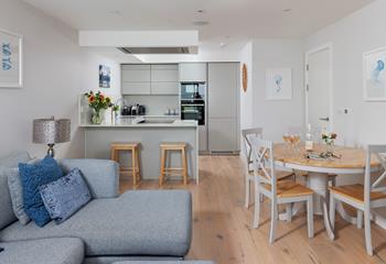 The open-plan living space is modern and stylish.