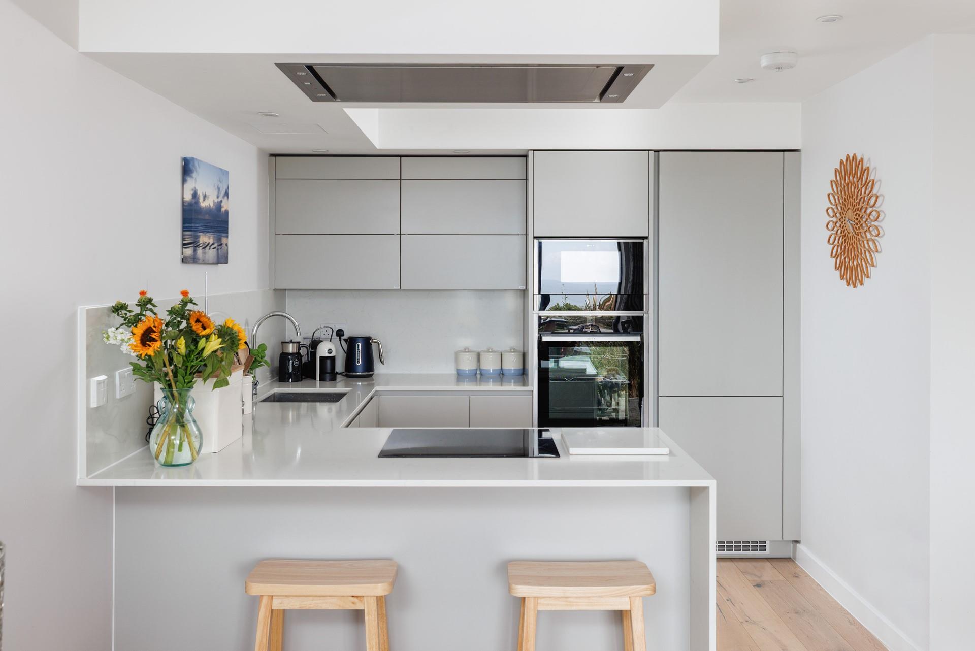 The modern kitchen is well equipped for cooking up a storm.