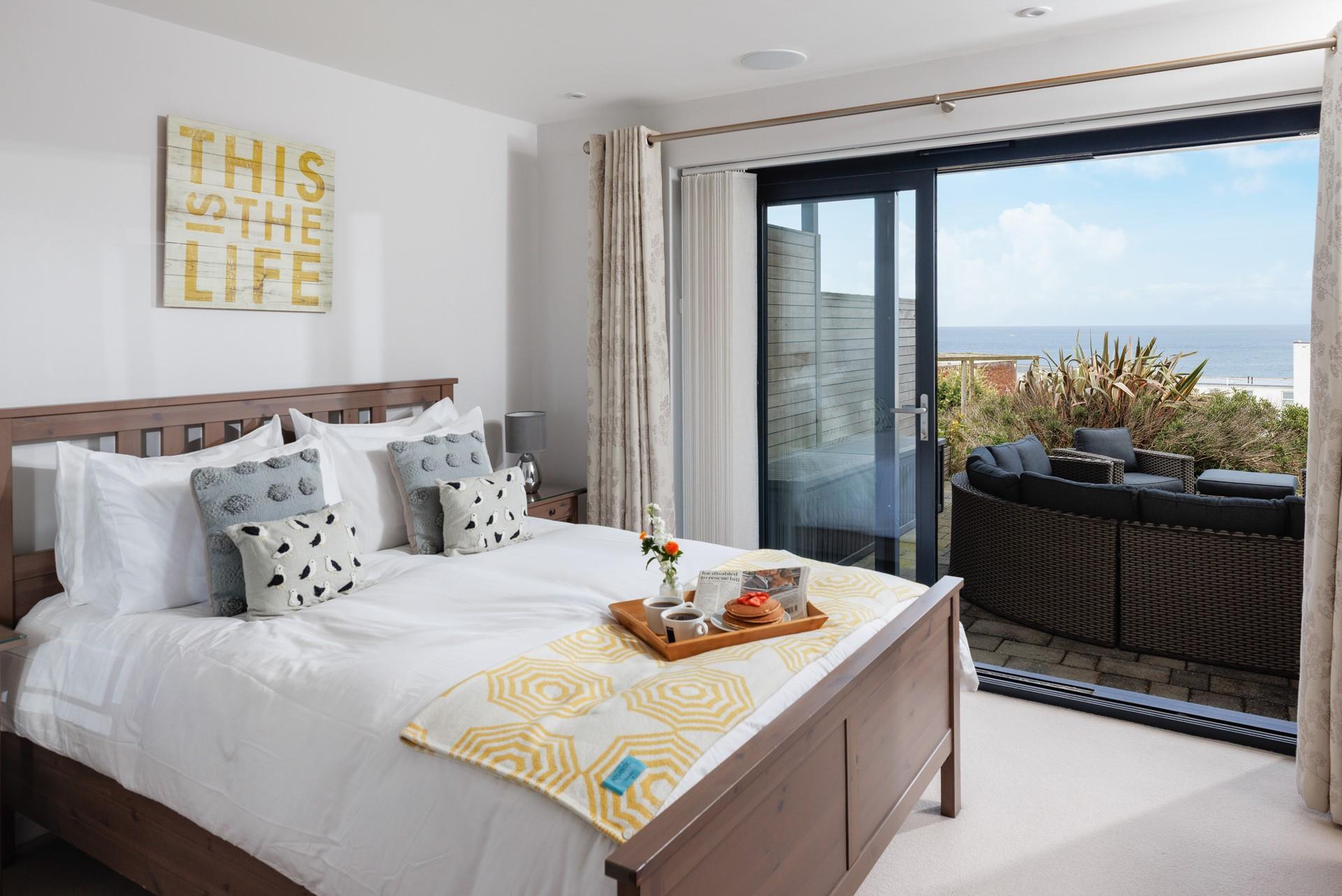 Doors from the bedroom lead out onto the terrace and communal gardens.