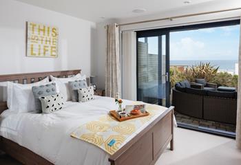 Doors from the bedroom lead out onto the terrace and communal gardens.