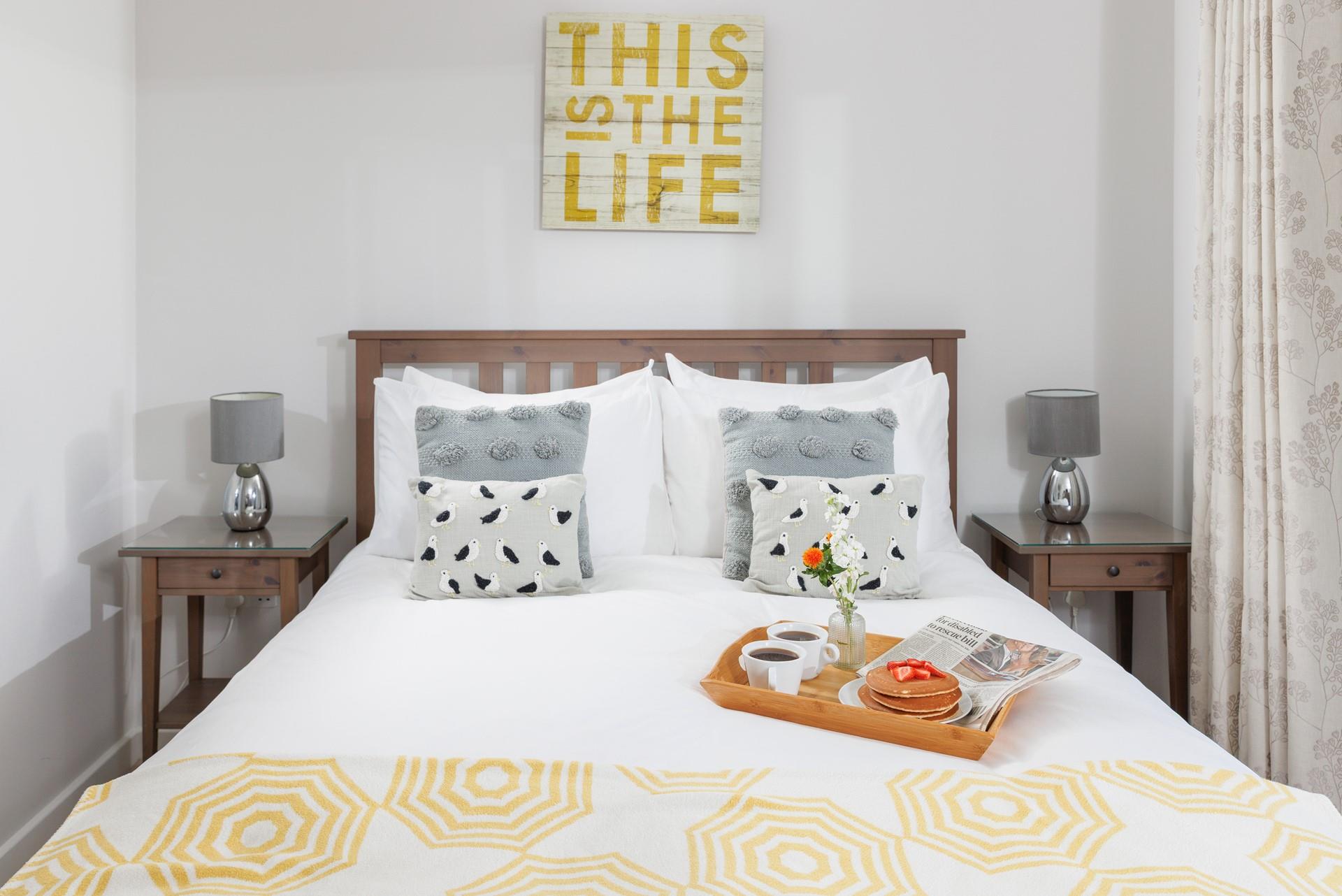 This is most definitely the life! The sumptuous king size bed promises a comfortable night's sleep.